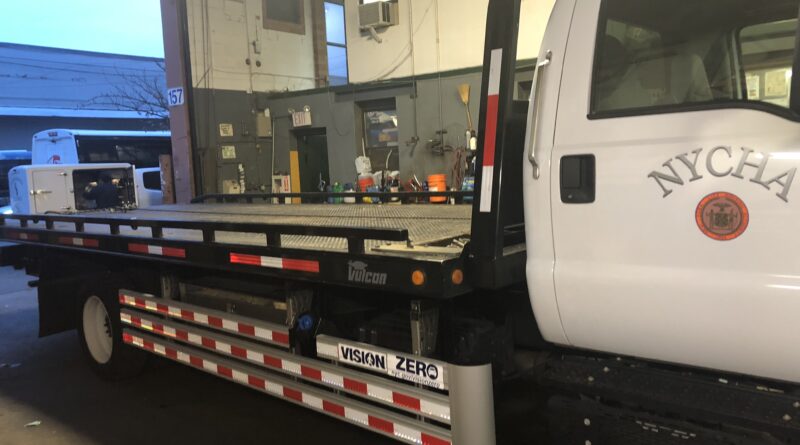 : An example of a sideguard on a NYCHA truck