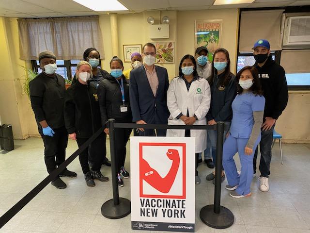 group of people at NYCHA COVID-19 Vaccine location