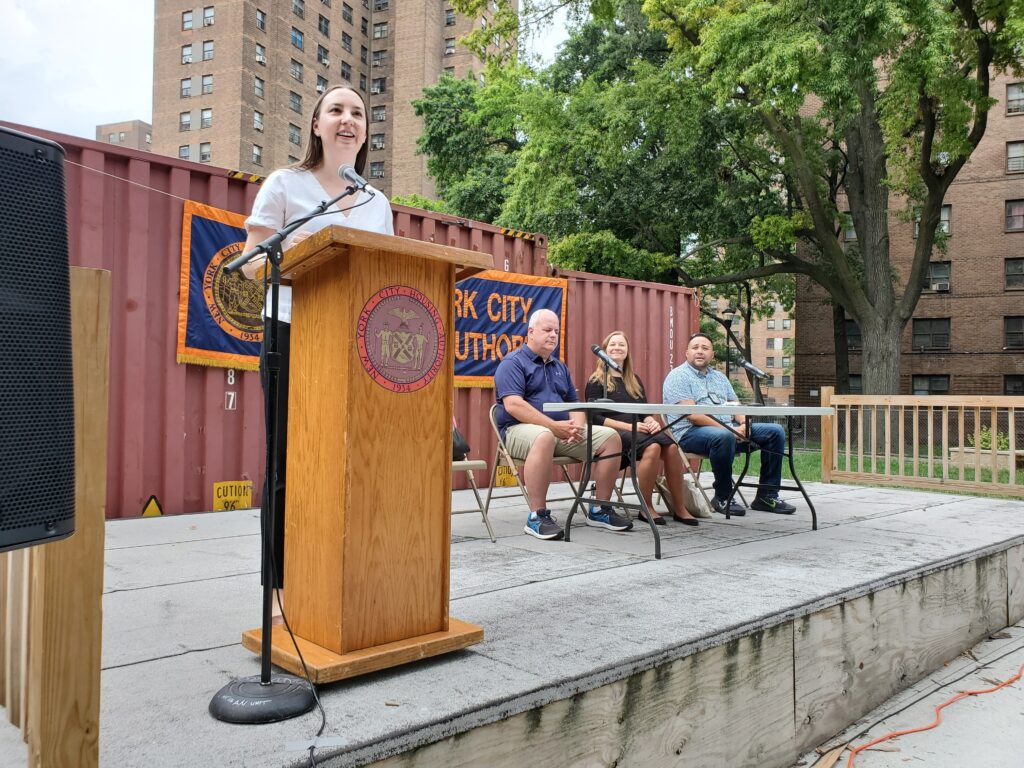 woman speaking at podium