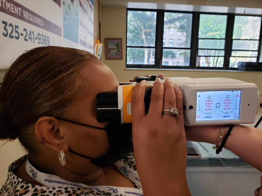 woman receiving eye exam
