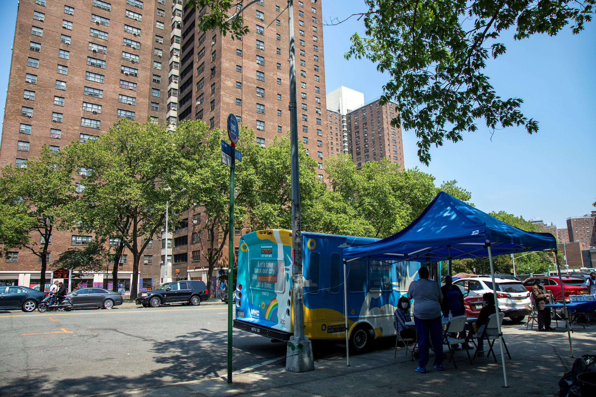 vaccine bus outside of NYCHA development