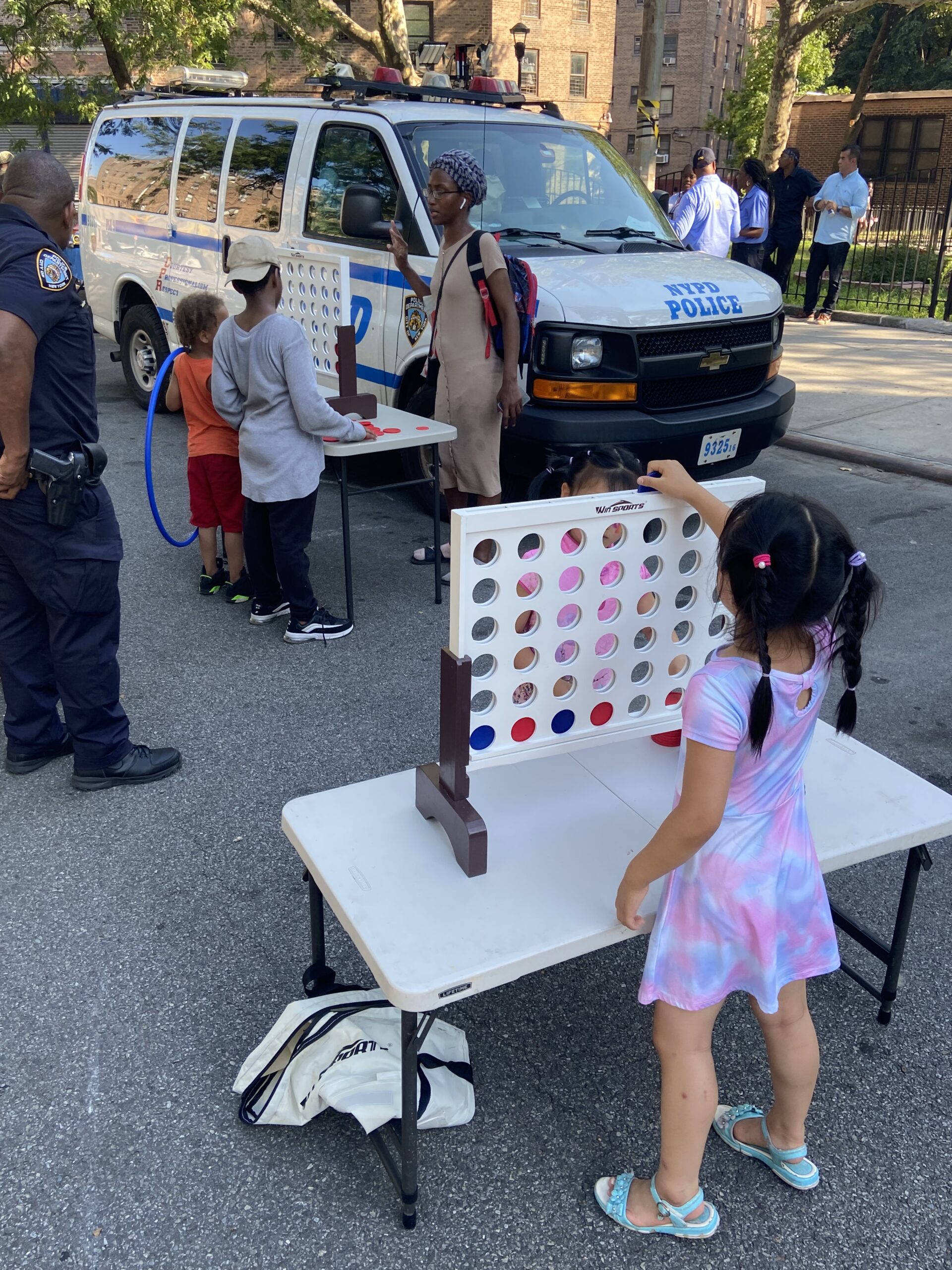 kids playing table connect four