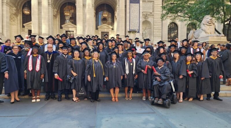 group of people wearing graduation caps and gowns
