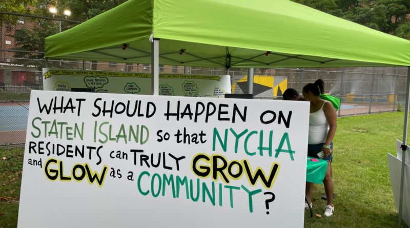 sign with text: "What should happen on Staten Island so that NYCHA residents can truly grow and glow as a community?"