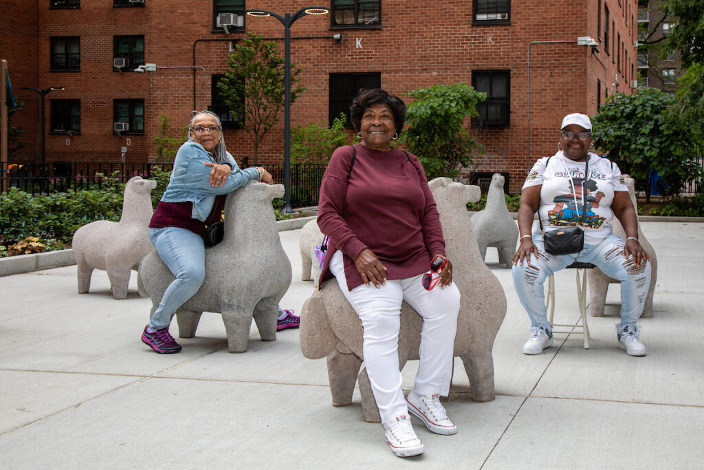 three women on horse statues