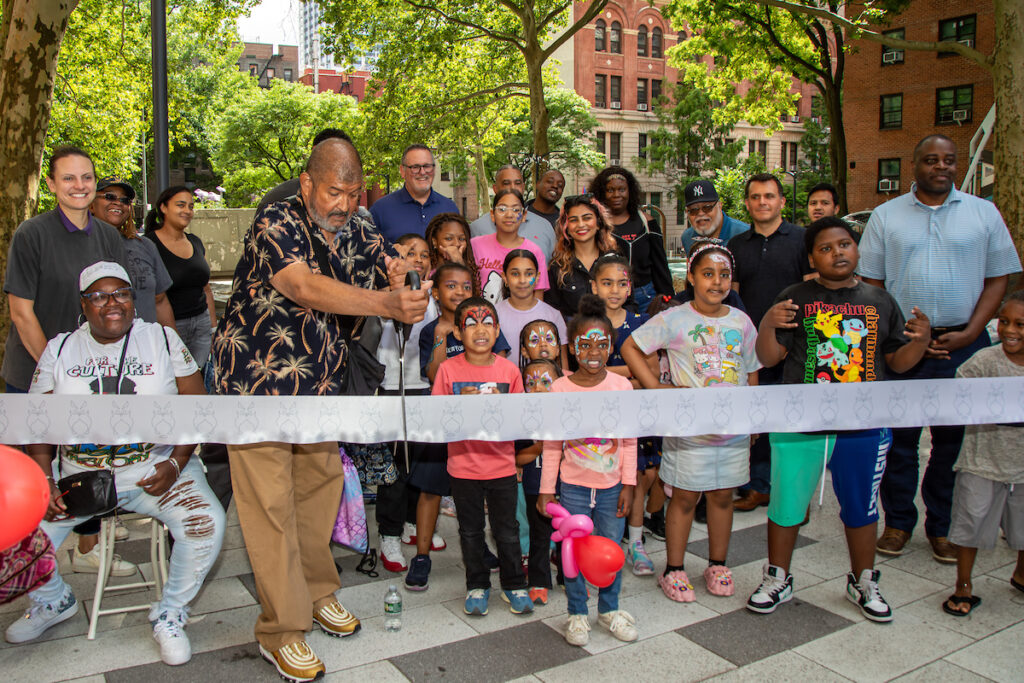 ribbon cutting at a playground