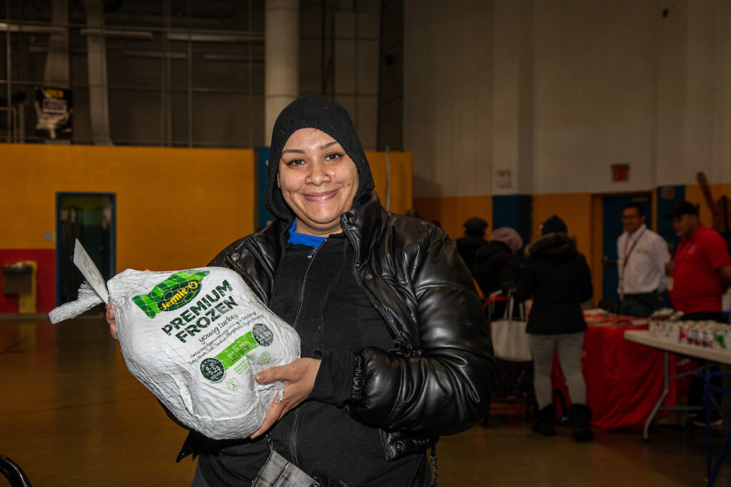 woman holding a turkey