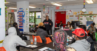 woman speaking to a class