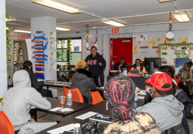 woman speaking to a class