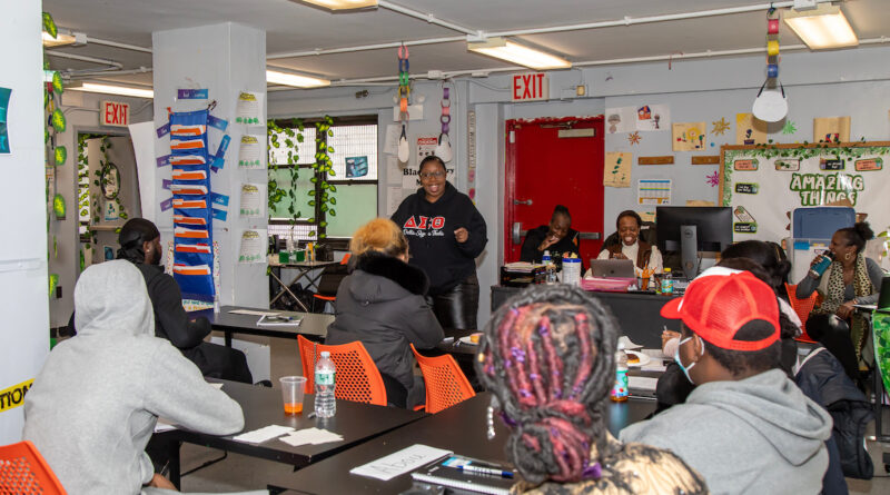 woman speaking to a class