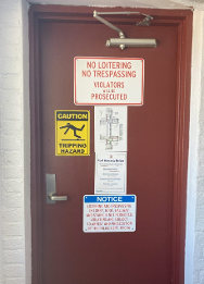Rooftop door with safety signage