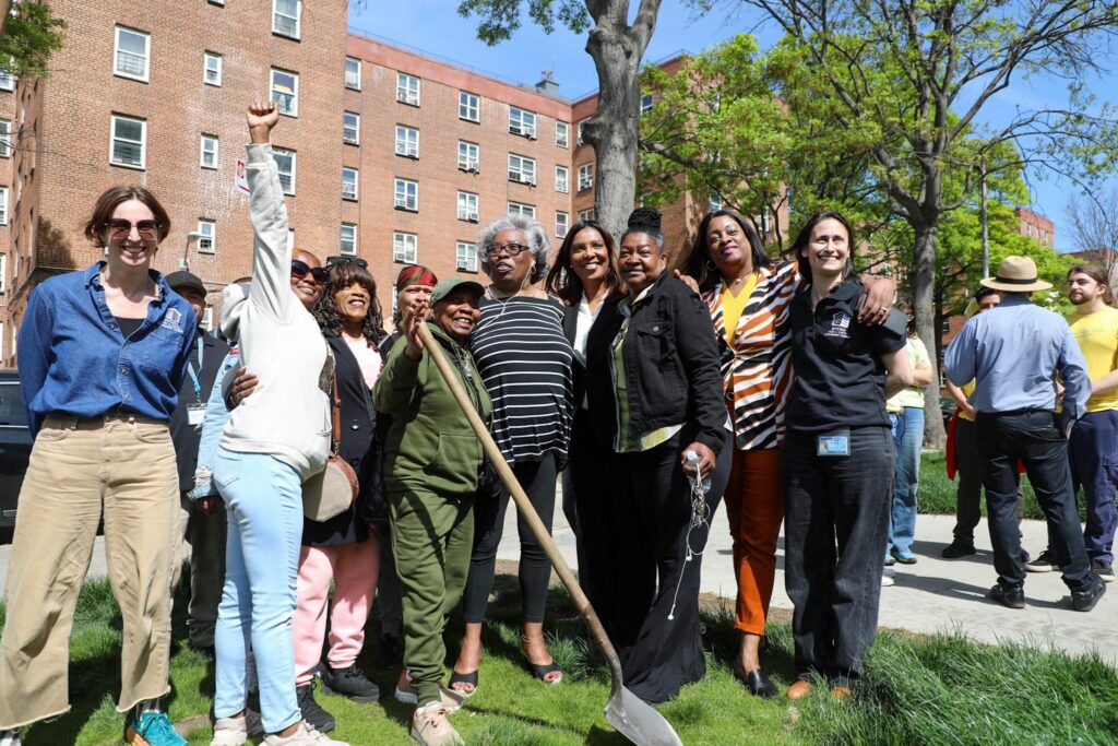 group of people at tree planting event