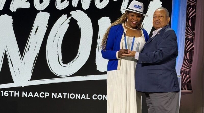 Woman and man on stage