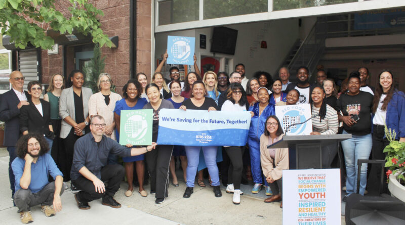 group of people holding signs