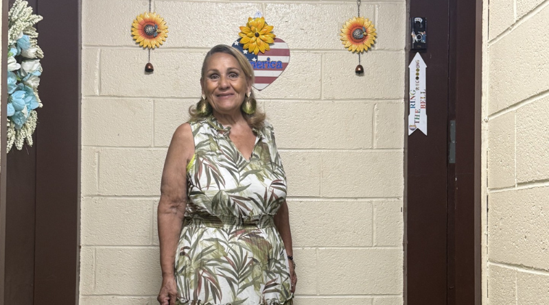 woman standing in hallway