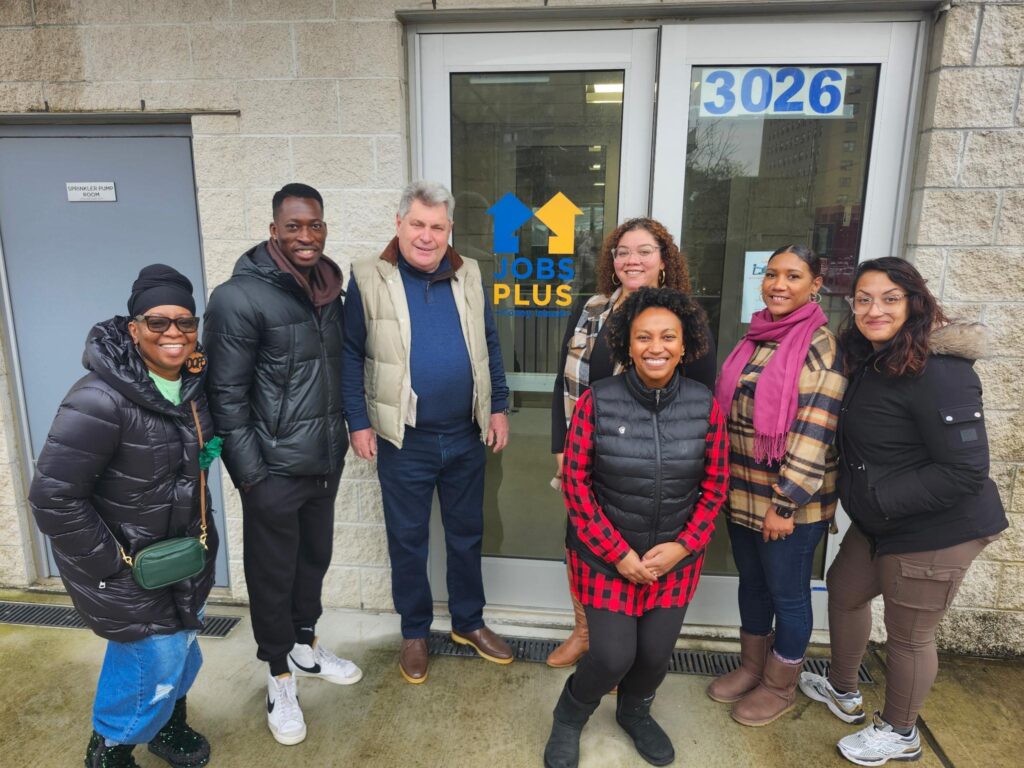 group of people in front of Jobs-Plus Coney Island