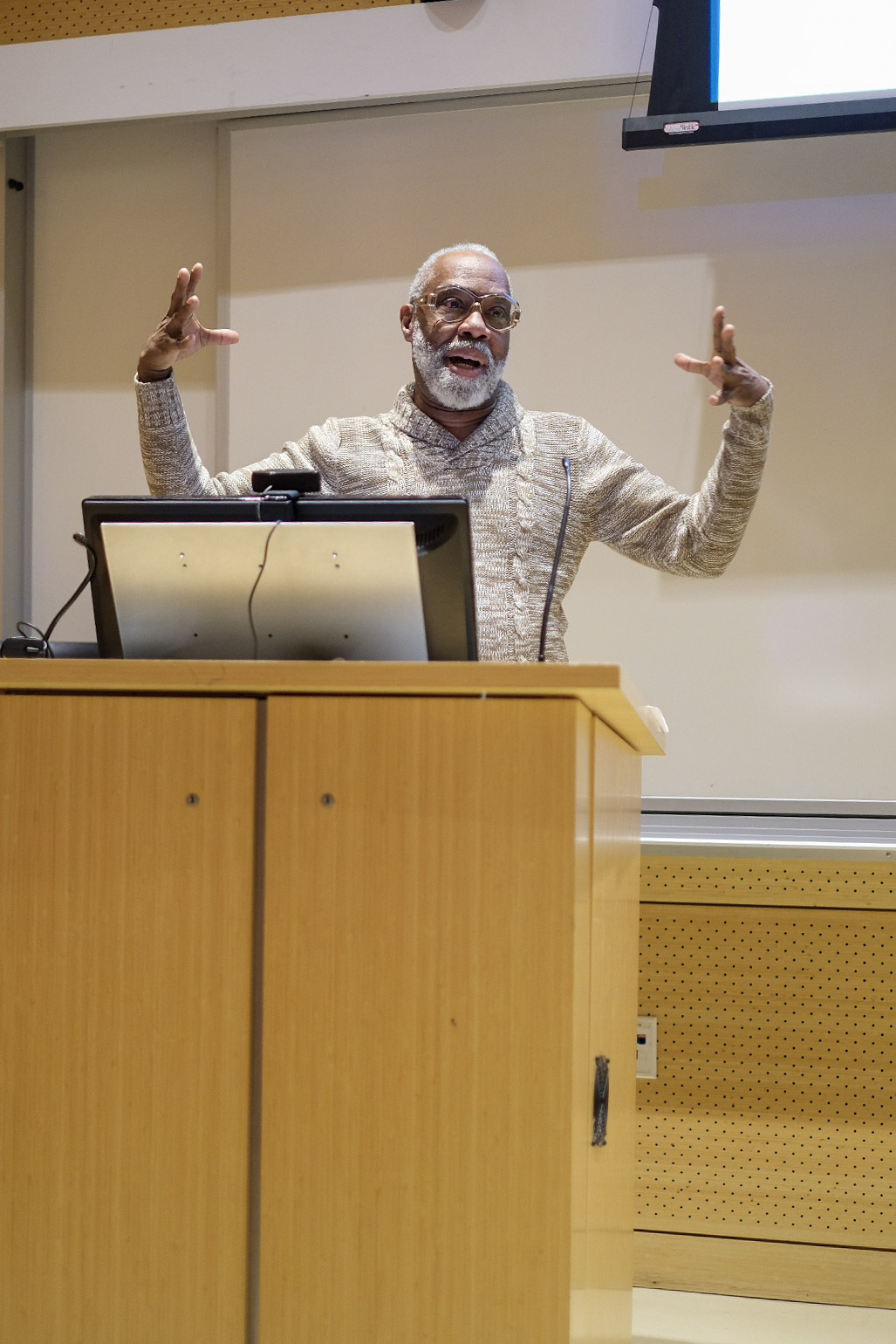 man standing at podium