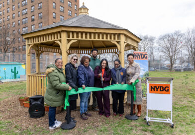 people standing in front of a gazebo
