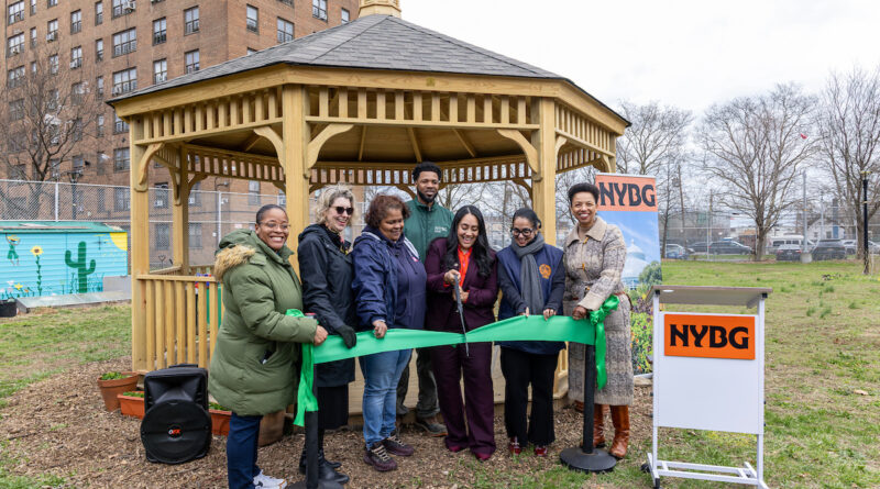 people standing in front of a gazebo