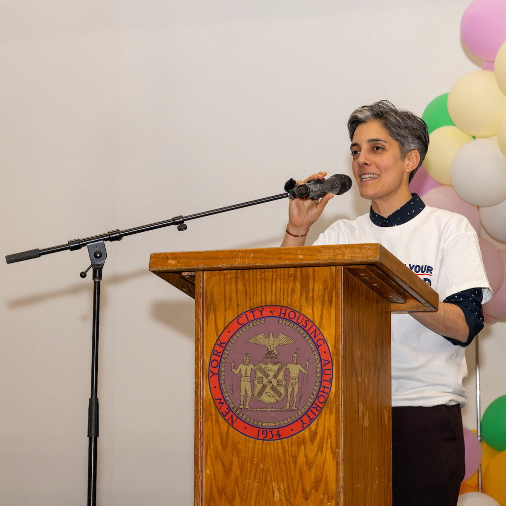 person at podium