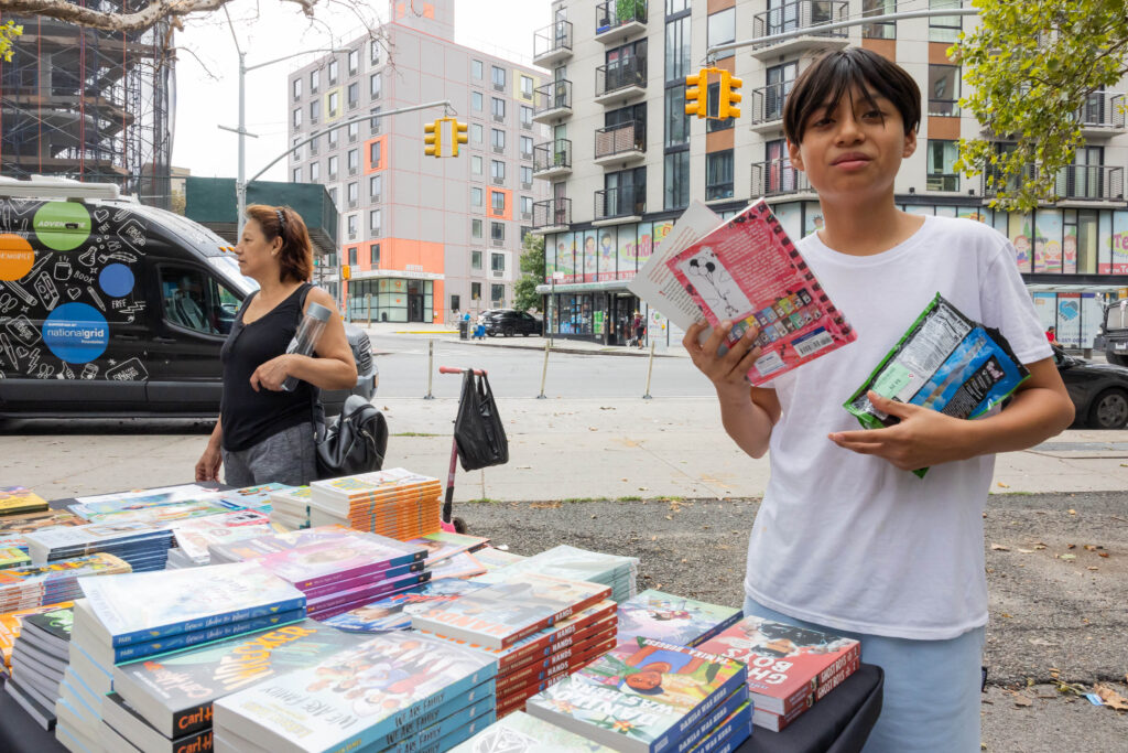teenage boy with books