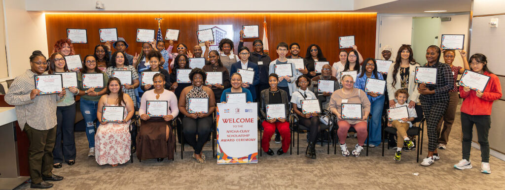A diverse group of recipients poses with their awards at the Nycha-Curry Scholarship Award Ceremony.
