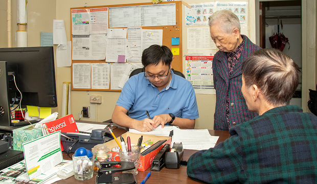 Grayson Lin assisting LaGuardia Addition residents. Grayson Lin assisting LaGuardia Addition residents.