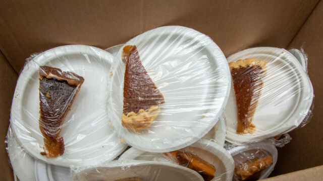 Distribution of meals prepared by Cornel's Catering to residents of Forest Houses and Eagle-163rd Street in the Bronx. slices of pie