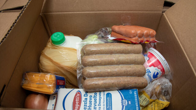 Astoria Houses and Urban Upbound Gas Outage Food Distribution cardboard box full of food groceries