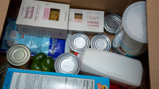 Astoria Houses and Urban Upbound Gas Outage Food Distribution cardboard box full of food groceries