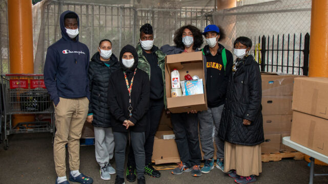 Astoria Houses and Urban Upbound Gas Outage Food Distribution group of people