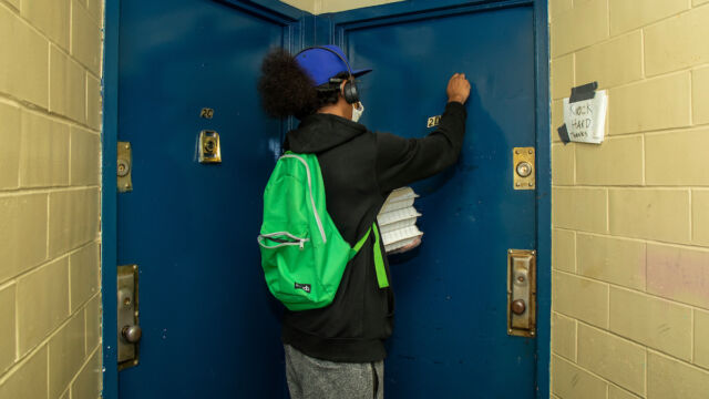 Astoria Houses and Urban Upbound Gas Outage Food Distribution man knocking on door