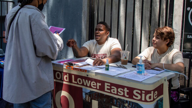 Bracetti Plaza's community resource fair featured vendor tables from local organizations, a visit by NYPD horses, and book donations.
