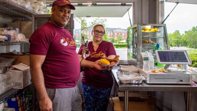 The team behind Sabor Restaurant & Bakery: Cristiana Franco and her husband Luis Rosario. man and woman