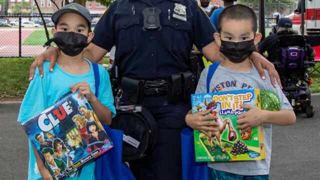 National Night Out at Linden Park woman police officer and two children