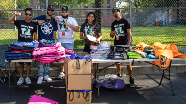 The court opening festivities featured a ribbon cutting and backpack giveaway. Backpack giveaway at Stapleton court