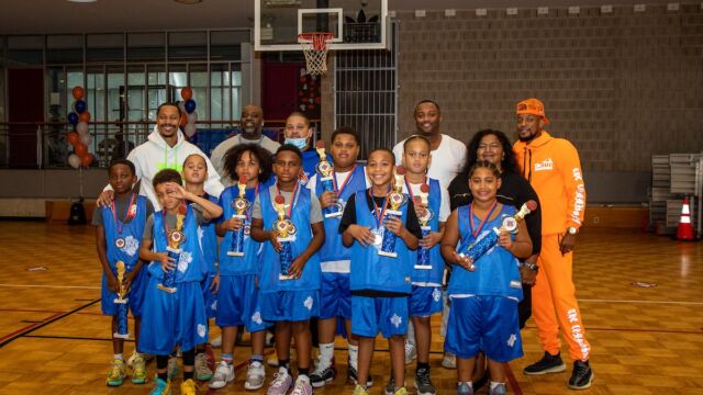 The Carver Houses team captured the league championship in the 11-and-under division. Junior Knicks champion Carver