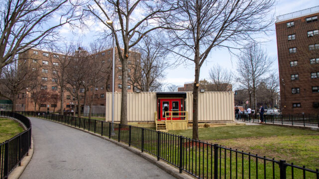 Ribbon Cutting Ceremony for Astoria Houses Floating Hospital shipping container transformed into a clinic inside the grounds of Astoria Houses