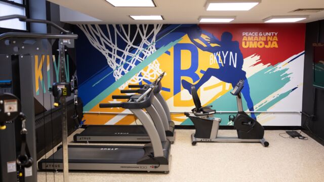 The renovated fitness area also received murals with community-focused themes.